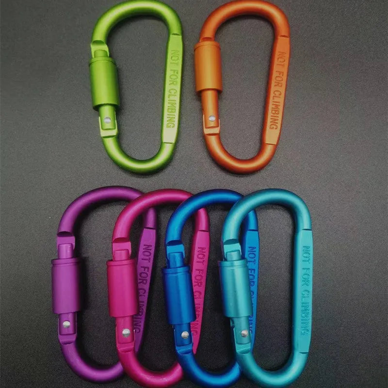 D-type aluminium locking climbing carabiner with screwgate, shown in a bright colour on a grey background.
