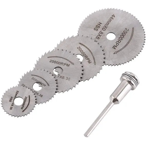 Set of six high-speed steel circular saw blades and a mandrel on a grey background.