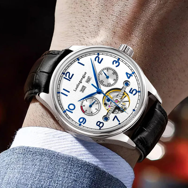 Men's stainless steel mechanical business watch with hollow movement visible through transparent case back