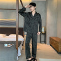 Men's black striped Ice Silk V-neck pyjama set with long sleeves and thin trousers.