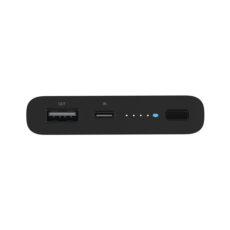 Black and white 10000mAh capacity power bank with wireless charging and USB ports