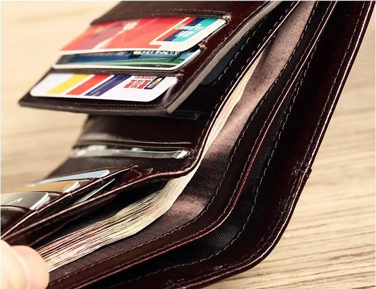 Men's leather wallet showing internal card slots, banknote folder, coin pocket, and document positions