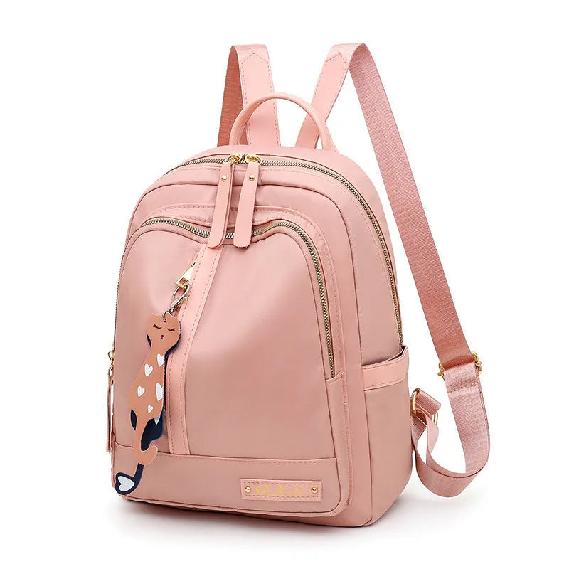 Women's black casual nylon backpack with multiple pockets and soft shoulder straps