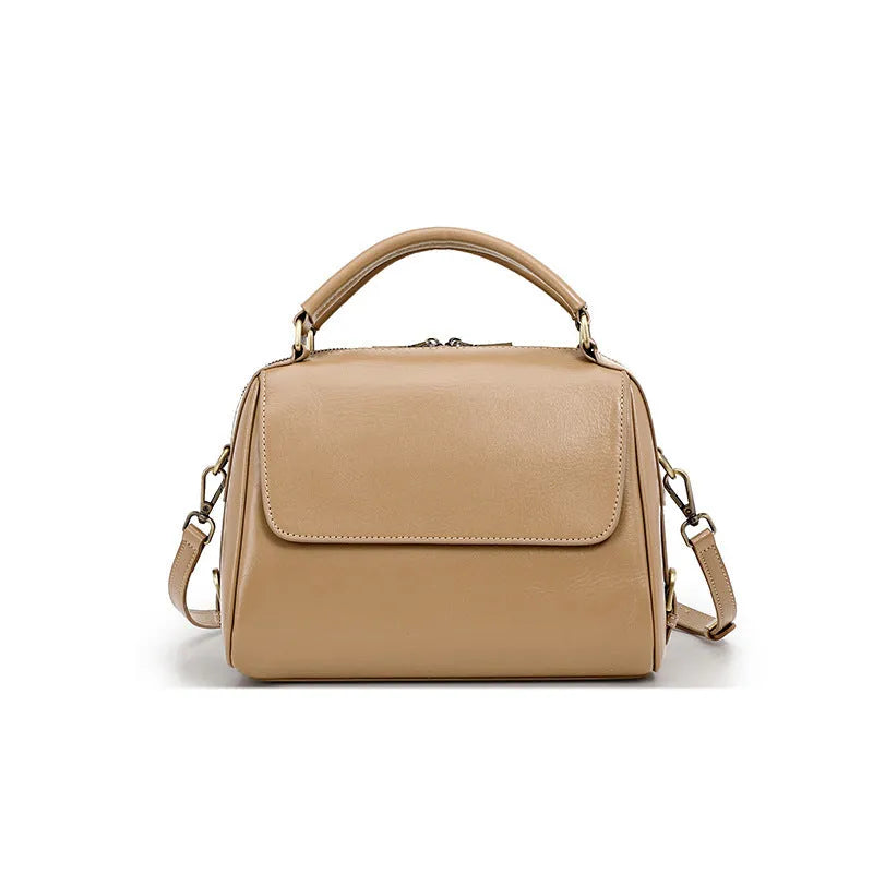 Women's soft genuine leather crossbody tote bag in a cross square shape with double straps.