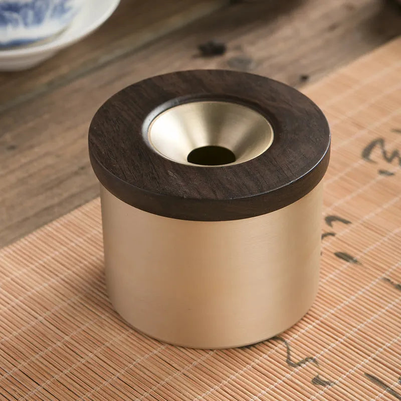 Solid copper retro ashtray with a wooden lid in black or rosewood, showing central air hole.