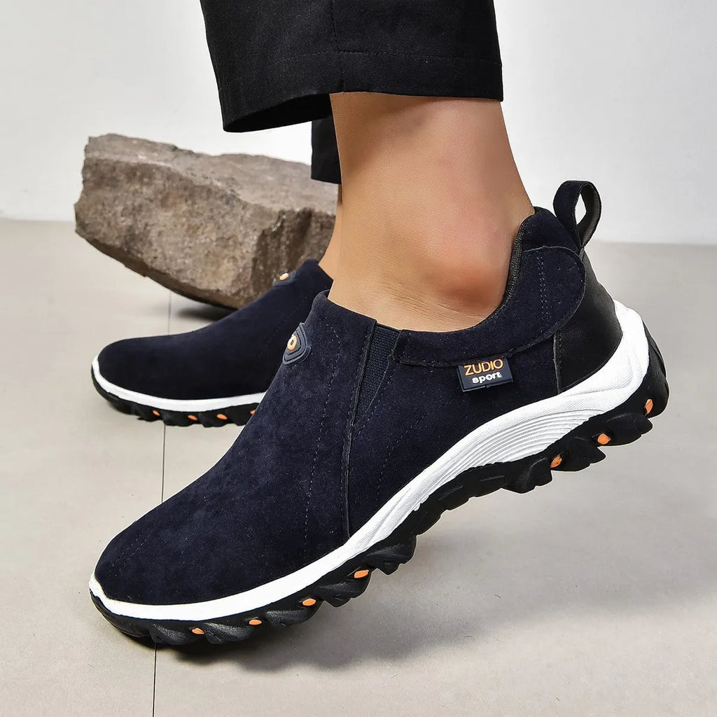 Men's round head thin shoe covers in multiple colours showing oversleeve design and rubber sole.