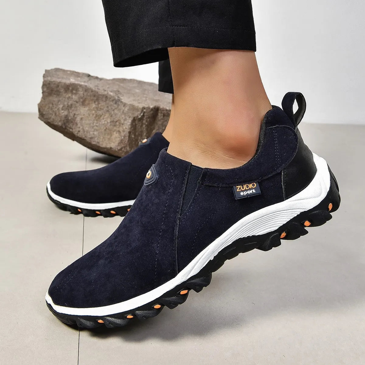 Men's round head thin shoe covers in multiple colours showing oversleeve design and rubber sole.