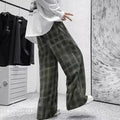 Japanese retro loose plaid trousers in straight-leg design showing black and green colour options