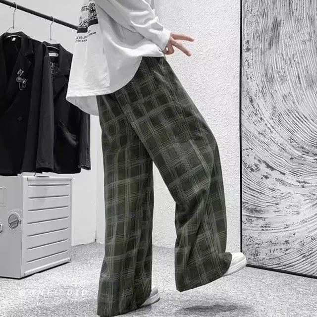 Japanese retro loose plaid trousers in straight-leg design showing black and green colour options