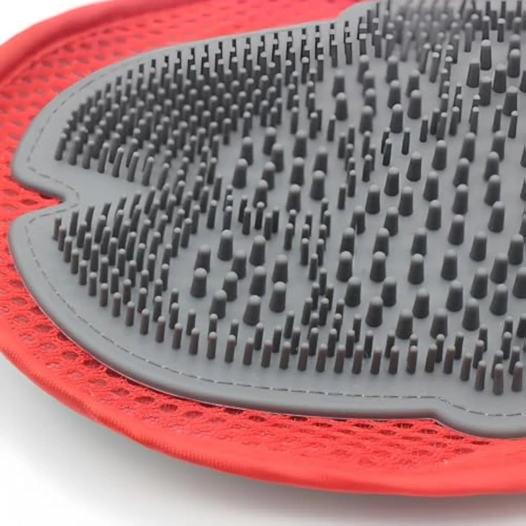 Red adjustable pet grooming and bathing glove for dogs and cats, showing brush surface.