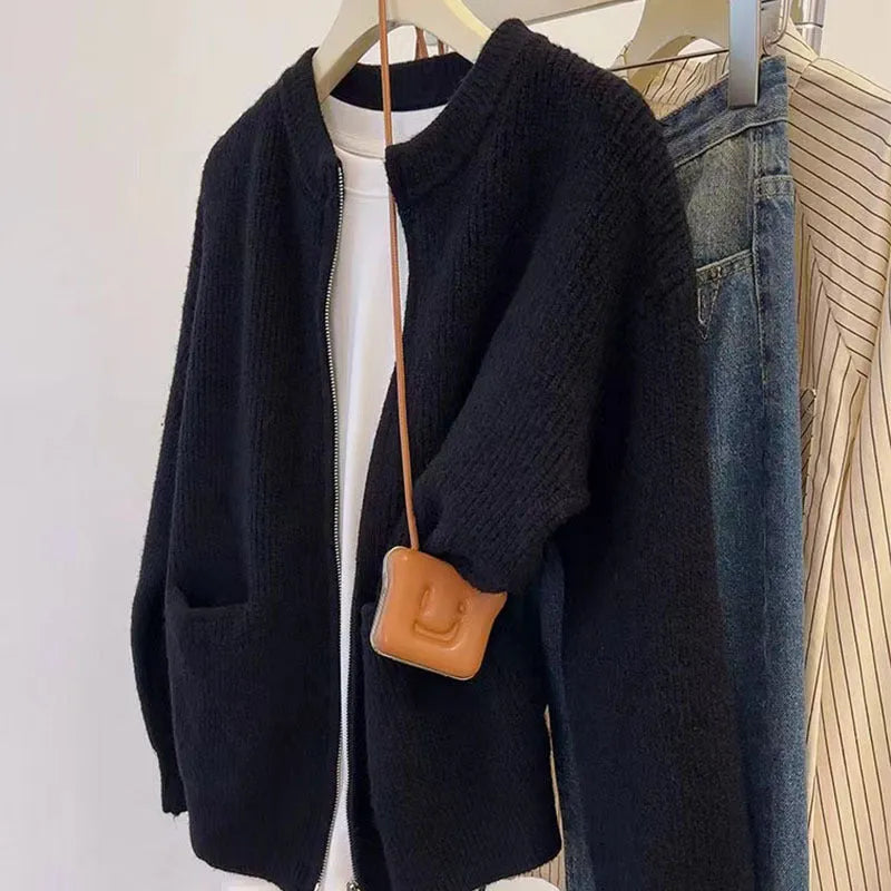 Soft viscose sweater coat in beige colour with long sleeves and cardigan style