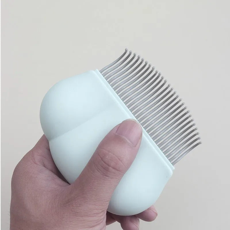 Blue Paw Soft deshedding brush for pets on a white background.