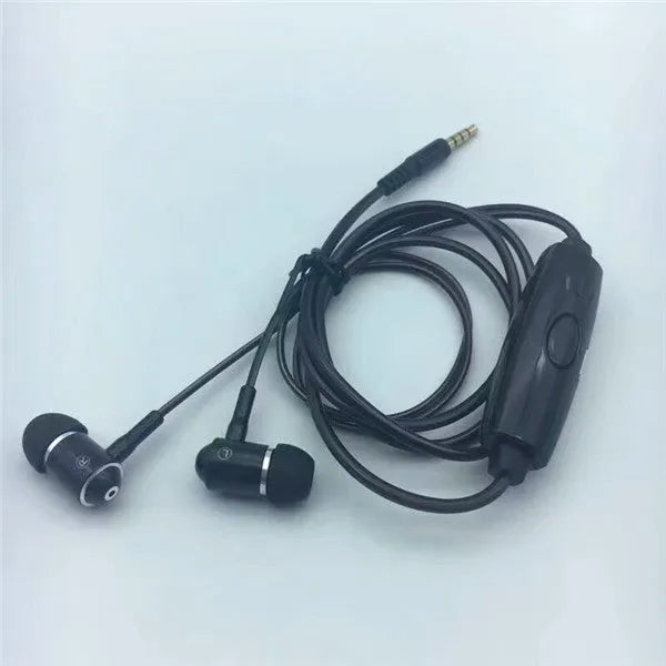 Close-up of blue LED earphones with aluminium alloy shells lit up, showing 3.5mm plug and inline remote.