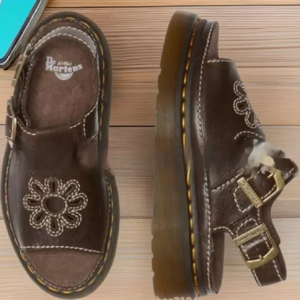 Men's black embroidered floral beach sandals with a flat heel, showing PU upper material.