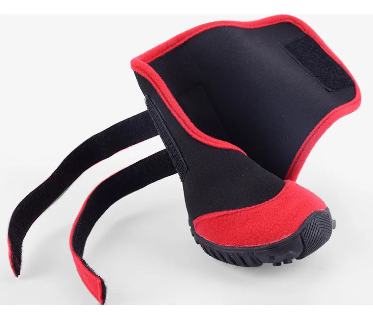 Waterproof pet shoes with wet suit fabric body, beef sole and multi-toothed non-slip tread in red or blue