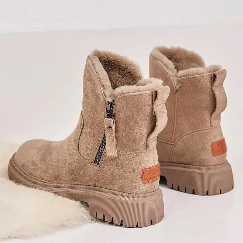 Women's black thick plush snow boots with side zipper, faux suede upper, and non-slip rubber sole.