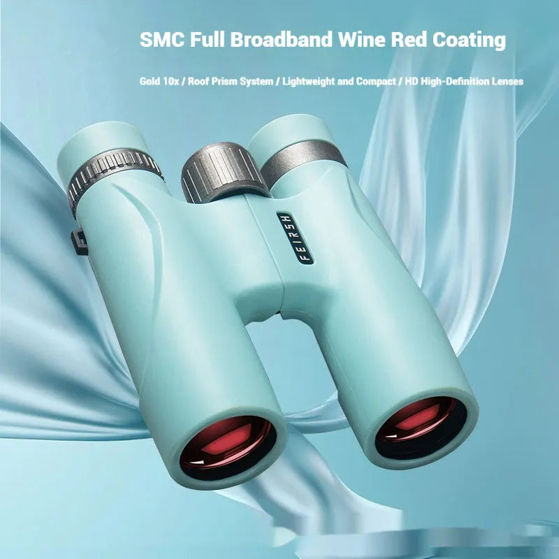 Compact blue or grey 10x32 binoculars with wine red film lenses on a plain background.