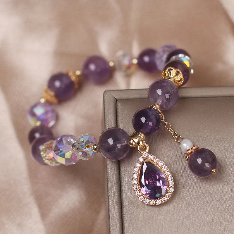 Purple amethyst crystal bracelet for women with micro inlay detail.
