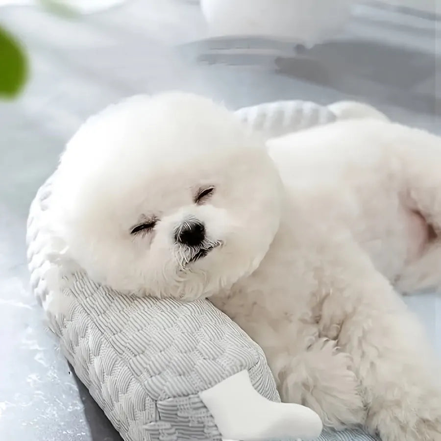 Blue monster design polyester pet bed for dogs and cats on a wooden floor.