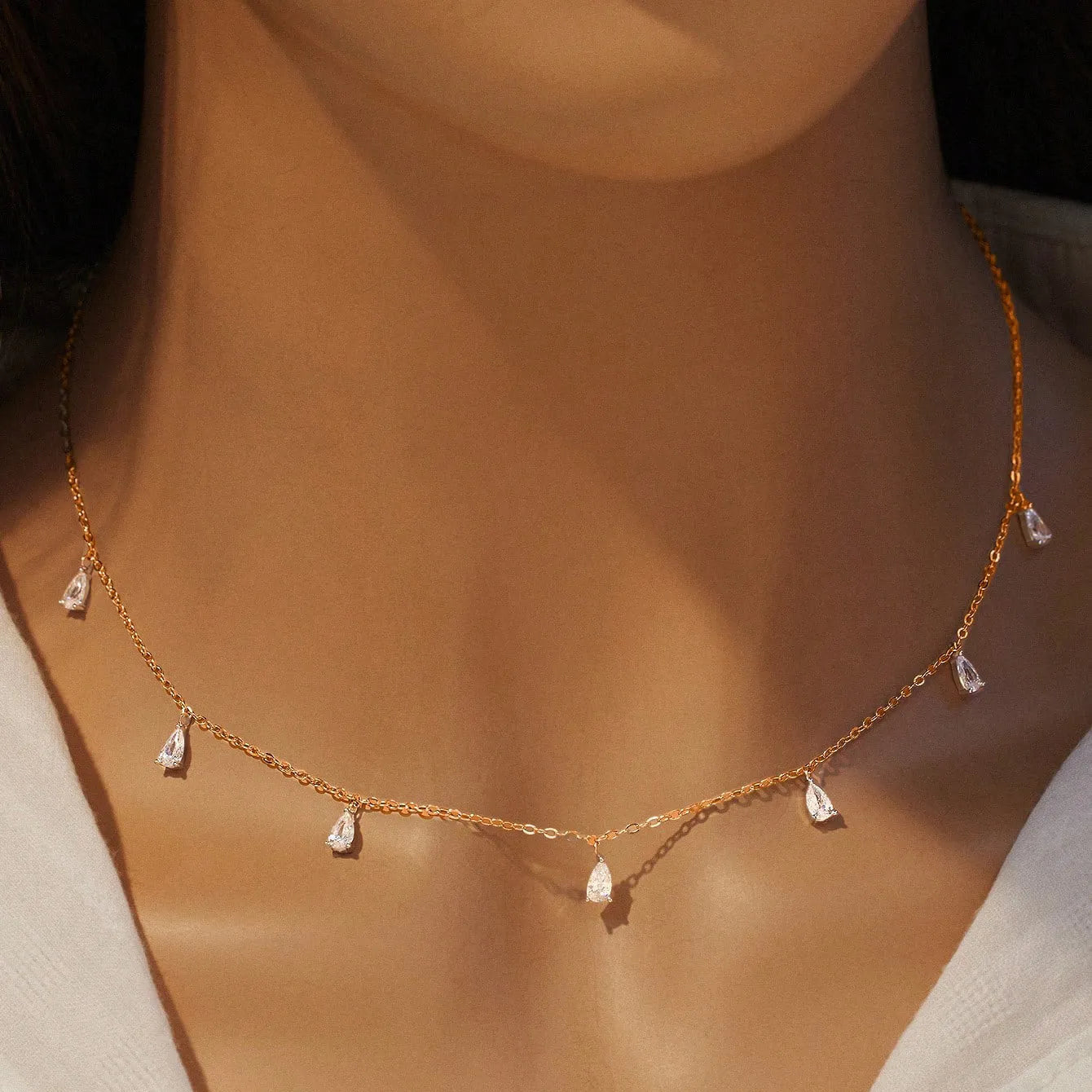 Women's 925 silver drop-shaped artificial zircon necklace on an adjustable O-chain, shown in silver finish.