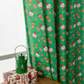 Christmas snowman angel print curtain in green colour with cartoon figures pattern