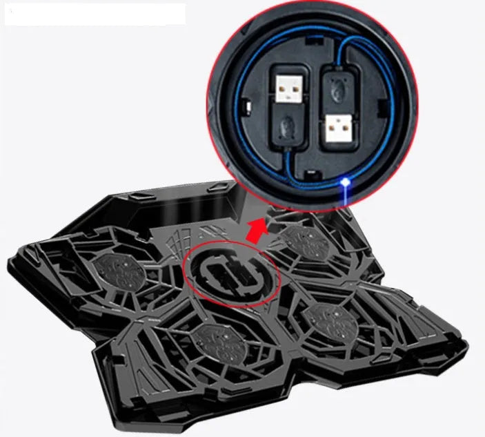 Blue PC cooling fan base with four LED-lit fans, speed switches, and USB ports on a desk.