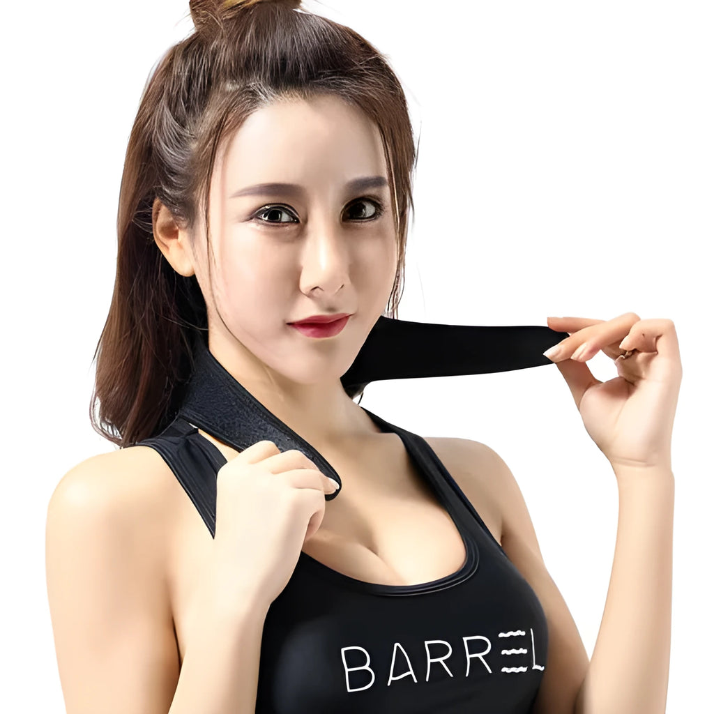 Black self-heating magnetic therapy neck guard with adjustable straps on a flat surface.