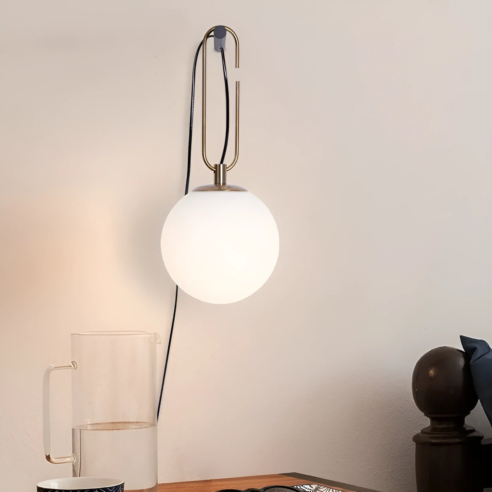 Modern clear glass wall lamp with dimmable LED light in three colour temperatures