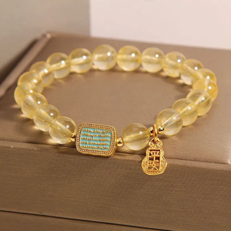 Women's natural yellow citrine crystal bracelet with rhinestone decorative details