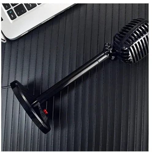 Black USB computer microphone on an adjustable stand with a weighted base.