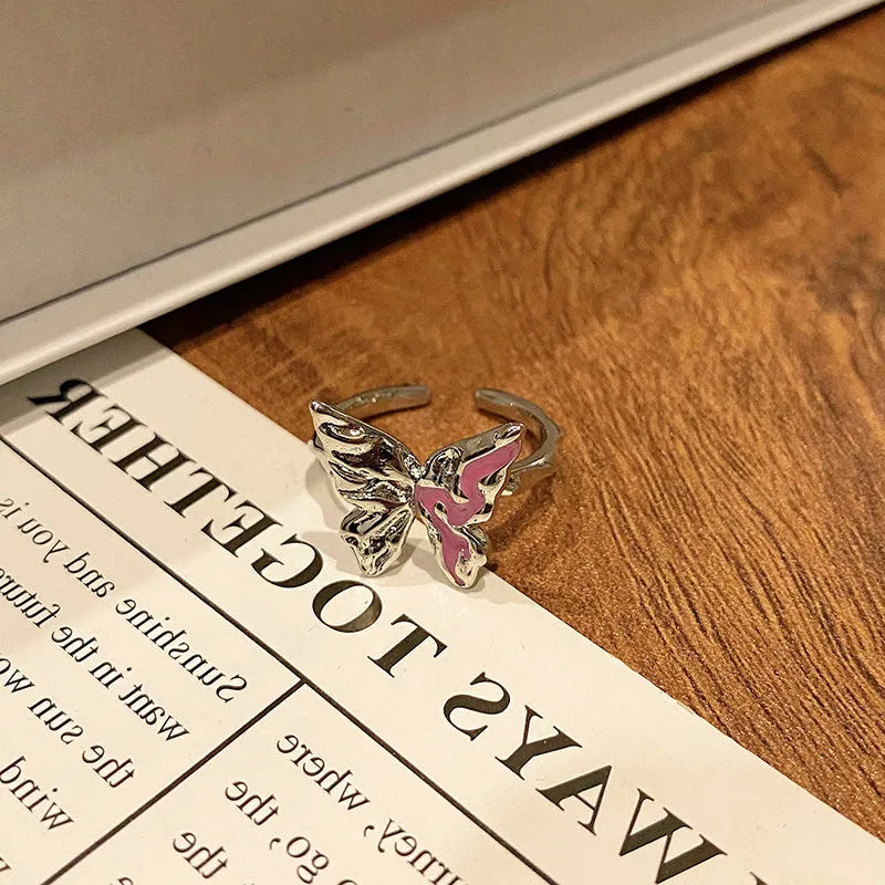 Butterfly women's copper ring with adjustable split ring design showing oil-drip colour treatment