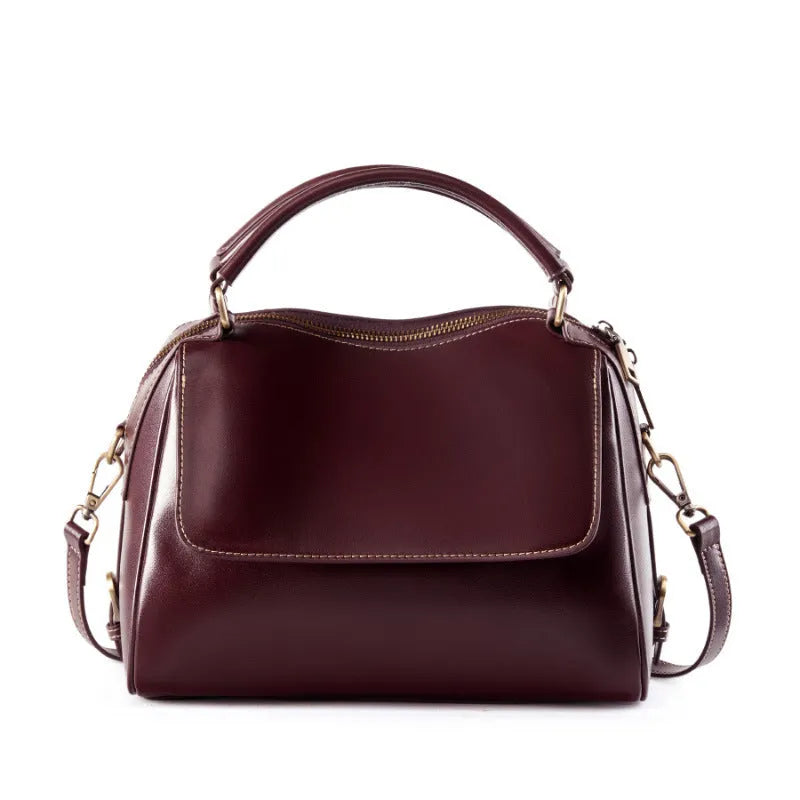 Women's soft genuine leather crossbody tote bag in a cross square shape with double straps.
