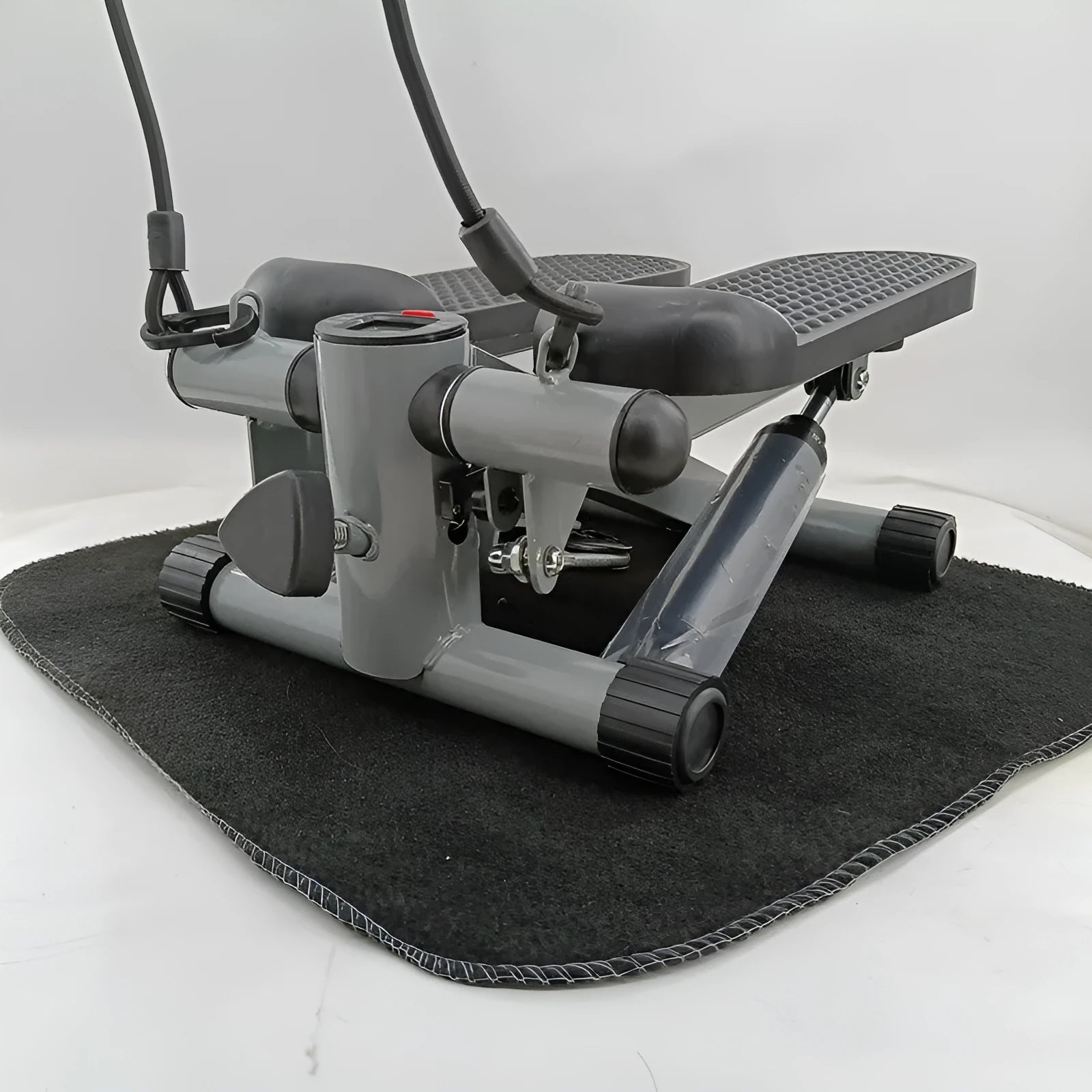 Silver grey hydraulic pedal exercise machine for home waist slimming workouts