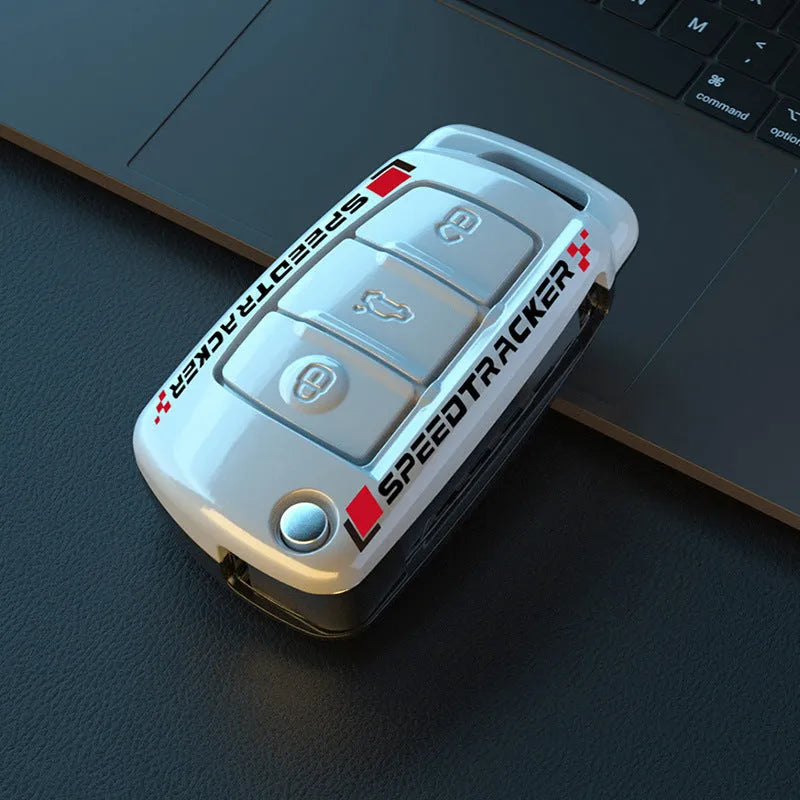 Carbon fibre style car key cover in carbon and white colours with mirror element