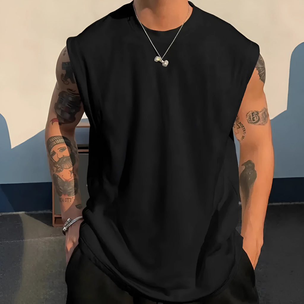 Men's loose fit cotton sleeveless tank top in solid colours showing front view