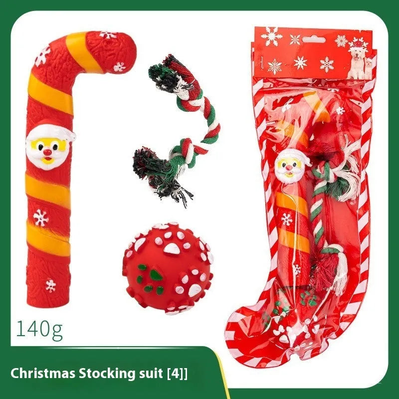 Christmas dog chew toys set with vinyl Santa heads, trees, and festive shapes in gift packaging
