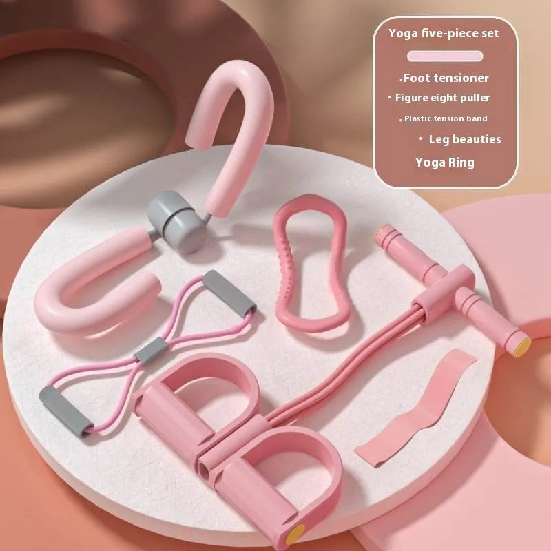 Yoga four piece set showing leg stretching device, foot pedaler, yoga ring, and figure eight tension rope.