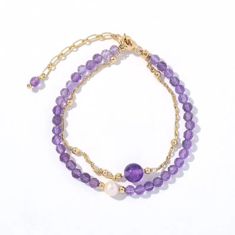 Chinese style women's crystal bracelet with amethyst coloured simulated diamond stones