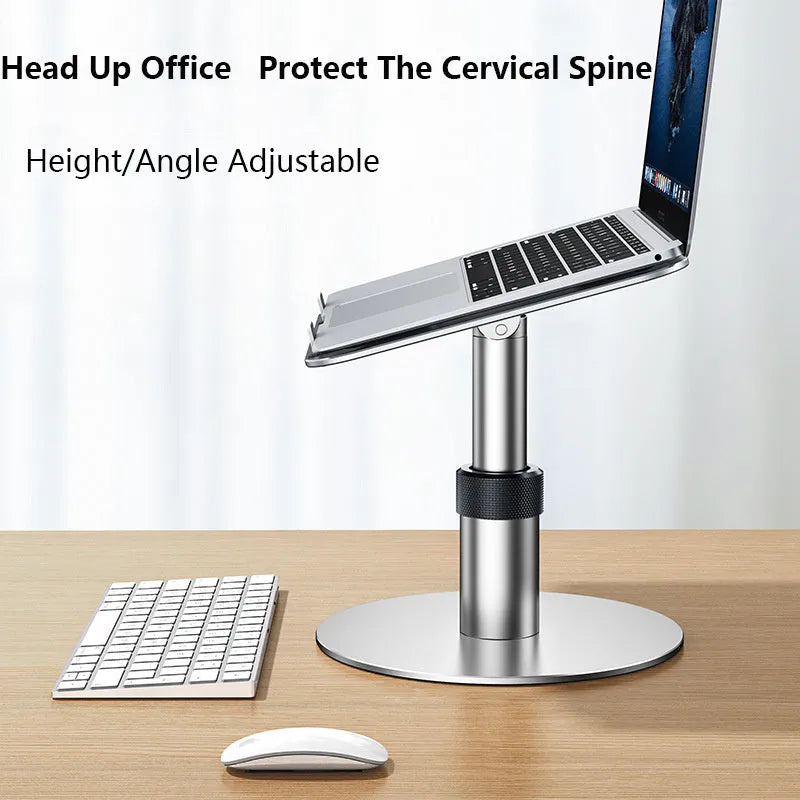 Silver aluminium car laptop stand with adjustable height and 360-degree rotating base on a car seat.