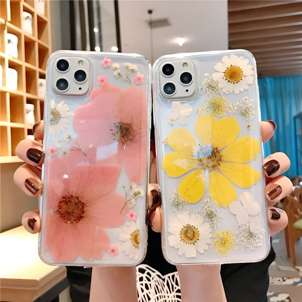 Floral iPhone case with large pink and yellow flower designs on flexible TPU back cover