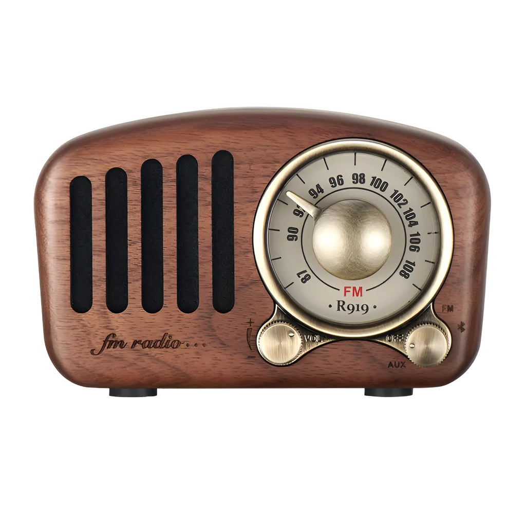 Compact retro wooden Bluetooth mini speaker in cherry wood finish showing front grille and wood grain.