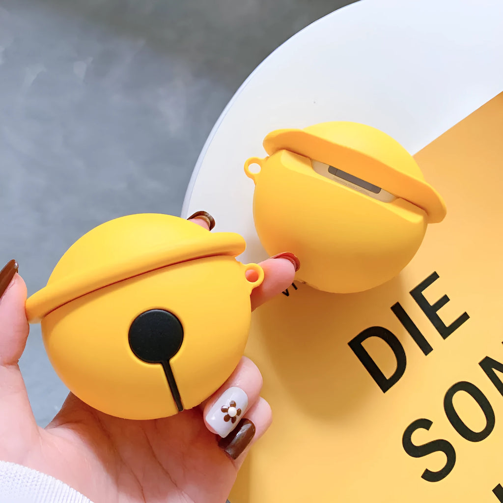 Yellow silicone bell-shaped case for AirPods with metal keychain ring attached