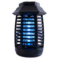 Black aromatherapy mosquito lamp insect killer with choice of international plug styles on a table.