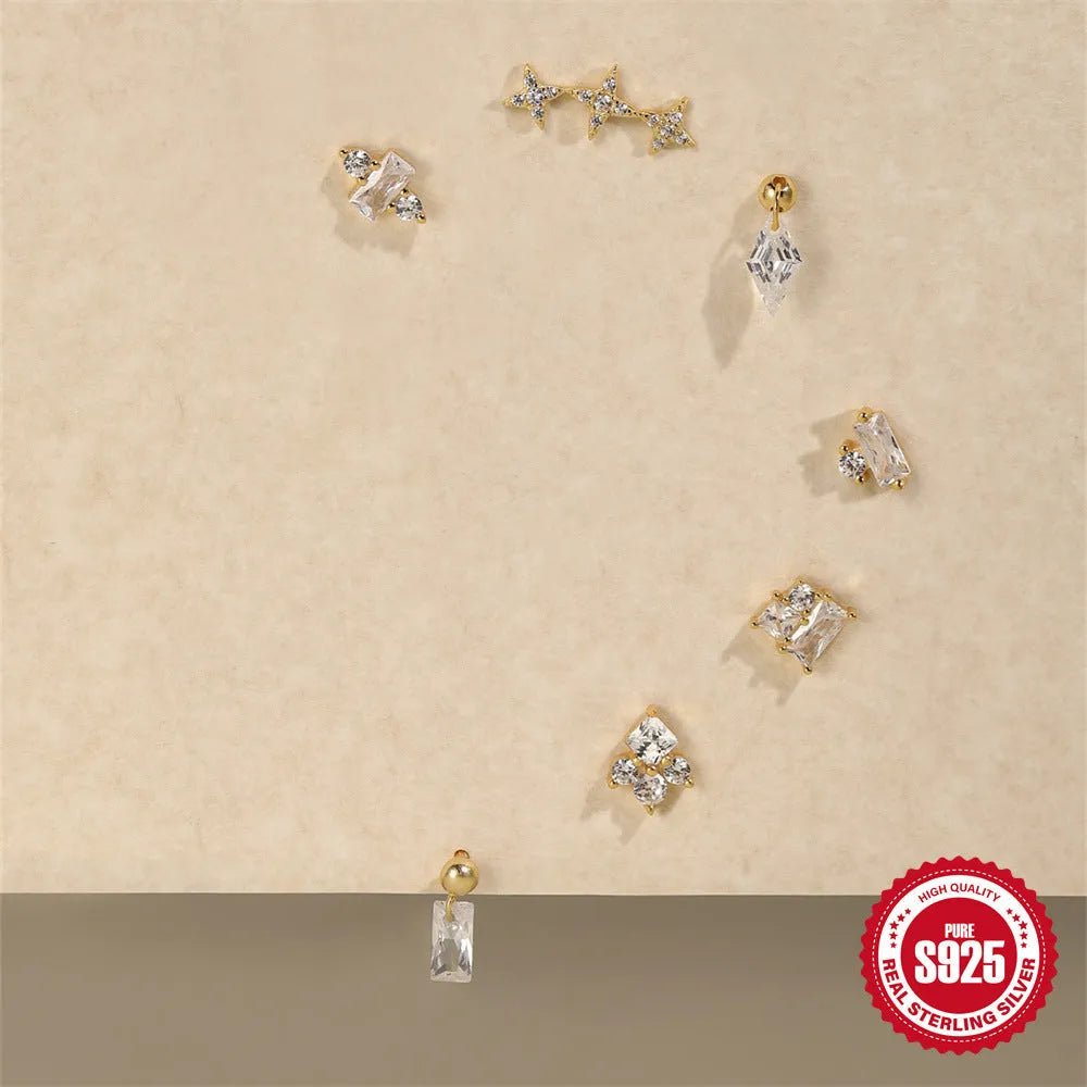 Close-up of S925 sterling silver stud earrings with a square gravel flower design in a gold-tone finish.