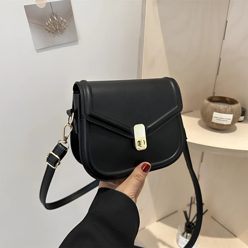 Soft PU clamshell messenger bag in horizontal square design shown in black colour