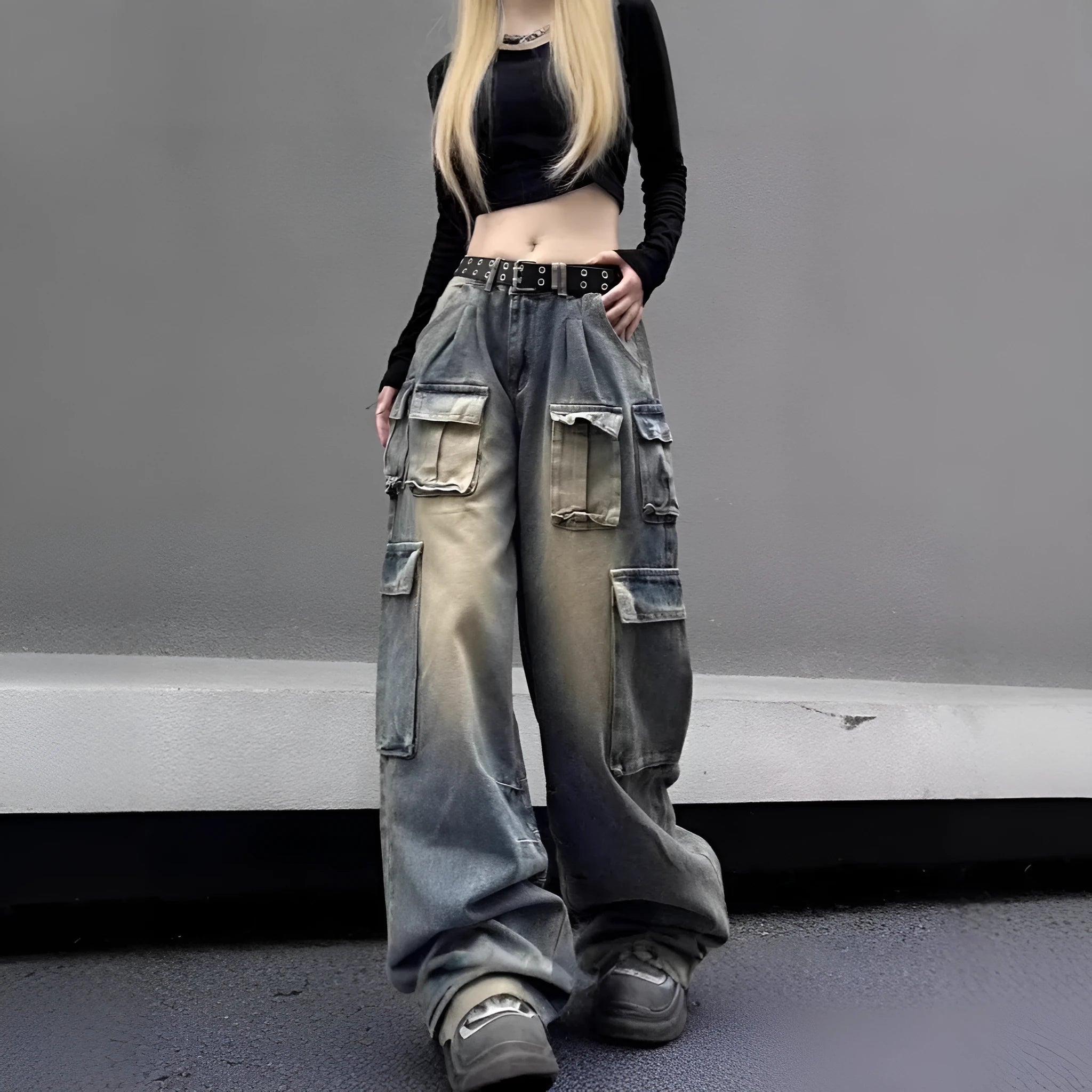 Light blue loose fit multi-pocket distressed jeans with straight leg cut and tooling style design