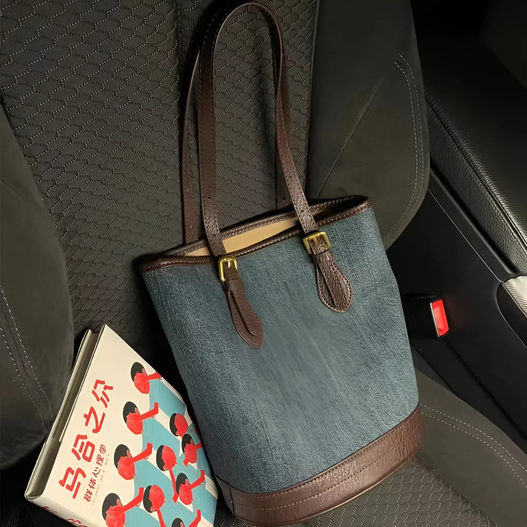 Denim colour patchwork handbag with retro bucket design showing 23cm width, 27cm height dimensions