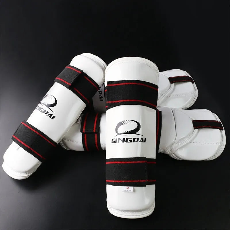 Taekwondo protective gear set showing leg protectors and arm guards in PU EVA foam material