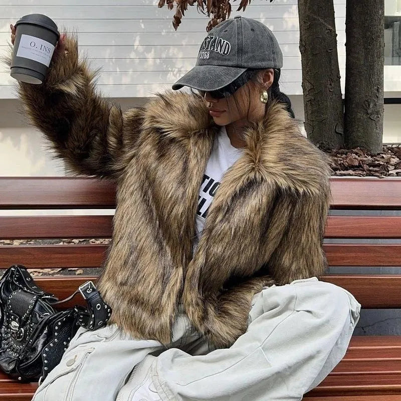 Women's artificial fur coat with fur collar in various colour options including black tip patterns