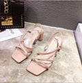 Women's thick heel sandals in white colour with over 8cm middle heel and sleeve wearing mode